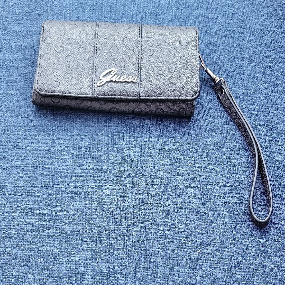 Guess Charcoal Wristlet with Logo Detail. Exceptional Quality.